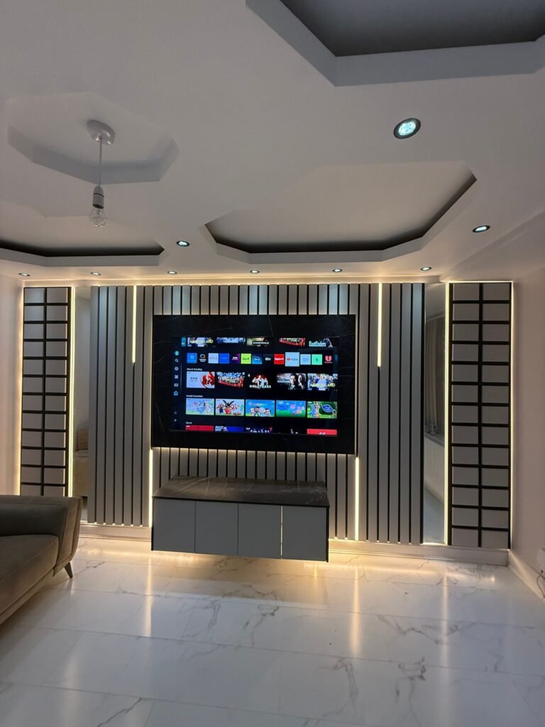 Black Slat Entertainment Wall with Marble Cabinet and Tall Cupboards